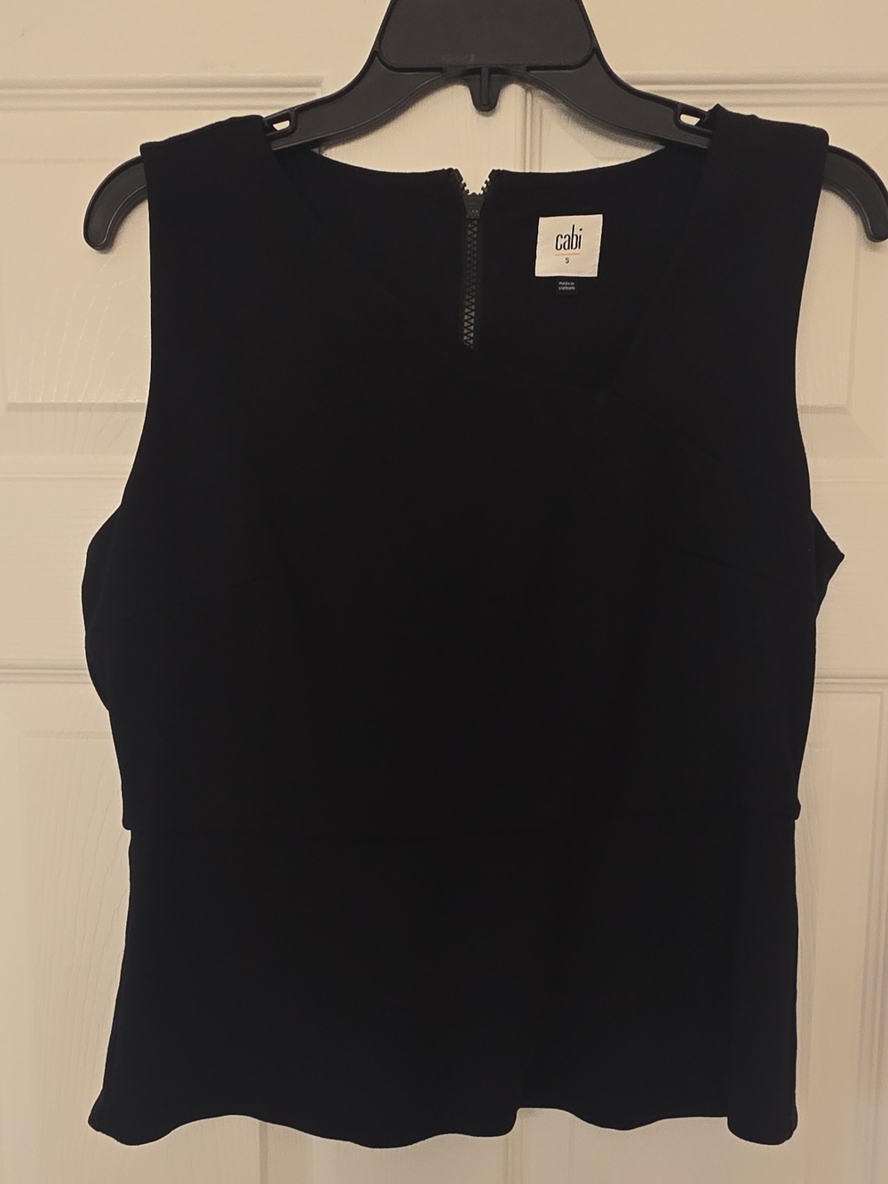 cabi Black Sleeveless Asymetrical Neck Peplum Top